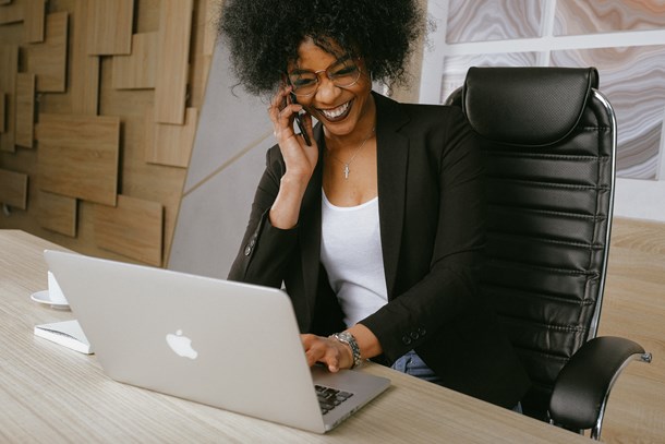 woman-in-black-blazer-sitting-on-black-office-chair-3727464.jpg